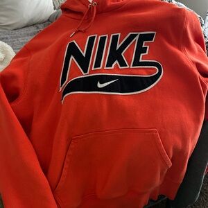 Nike Men’s Bright Orange Hoodie with Black Logo